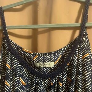 Great lightweight dress with braided detail around the front and straps. Size M